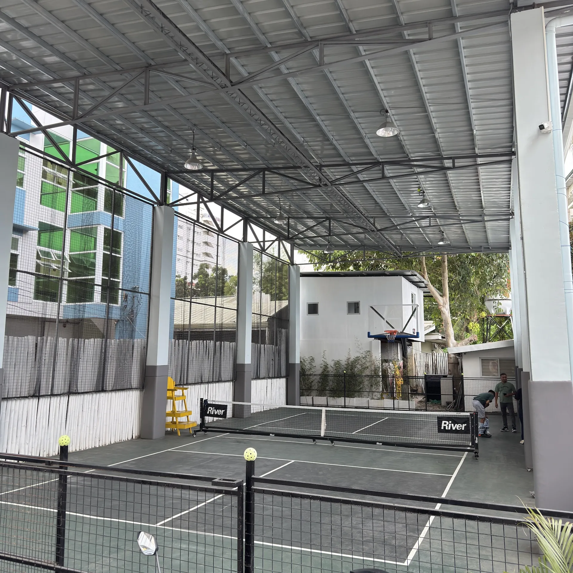 The covered pickleball court and net in Mabolo
