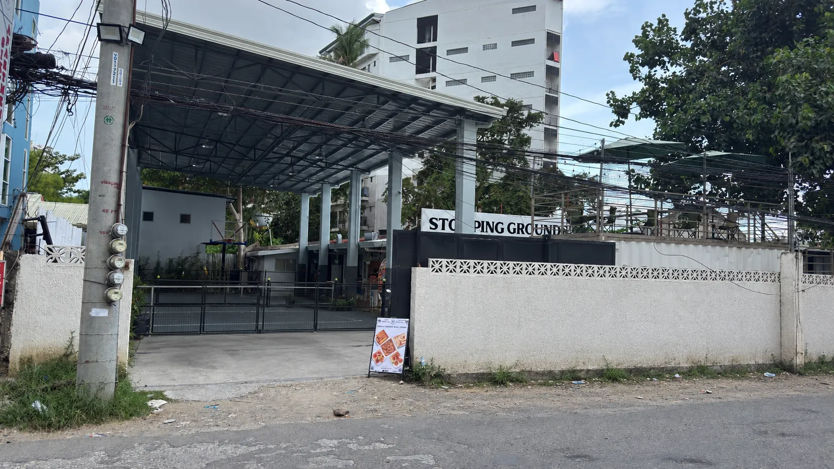 The Stomping Grounds sign and entrance approach in Mabolo